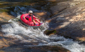 Tubing on Gore Creek, Vail river tube rentals, Summer adventure in Vail