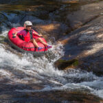 Tubing on Gore Creek, Vail river tube rentals, Summer adventure in Vail